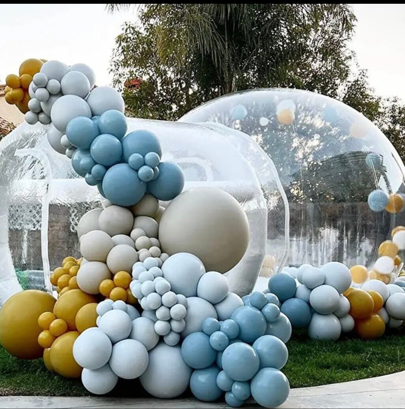 Neutral beige modular soft play fencing, ball pit and slide outdoors